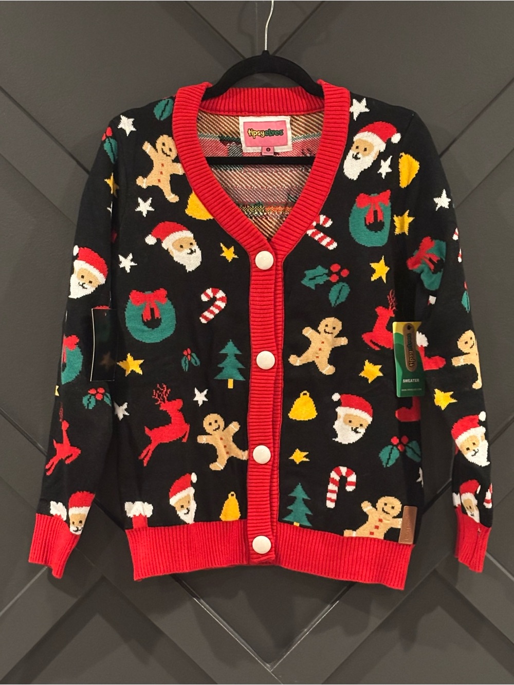 Tipsy Elves Black Christmas Cardigan with Red Trim and Multicolor Motifs